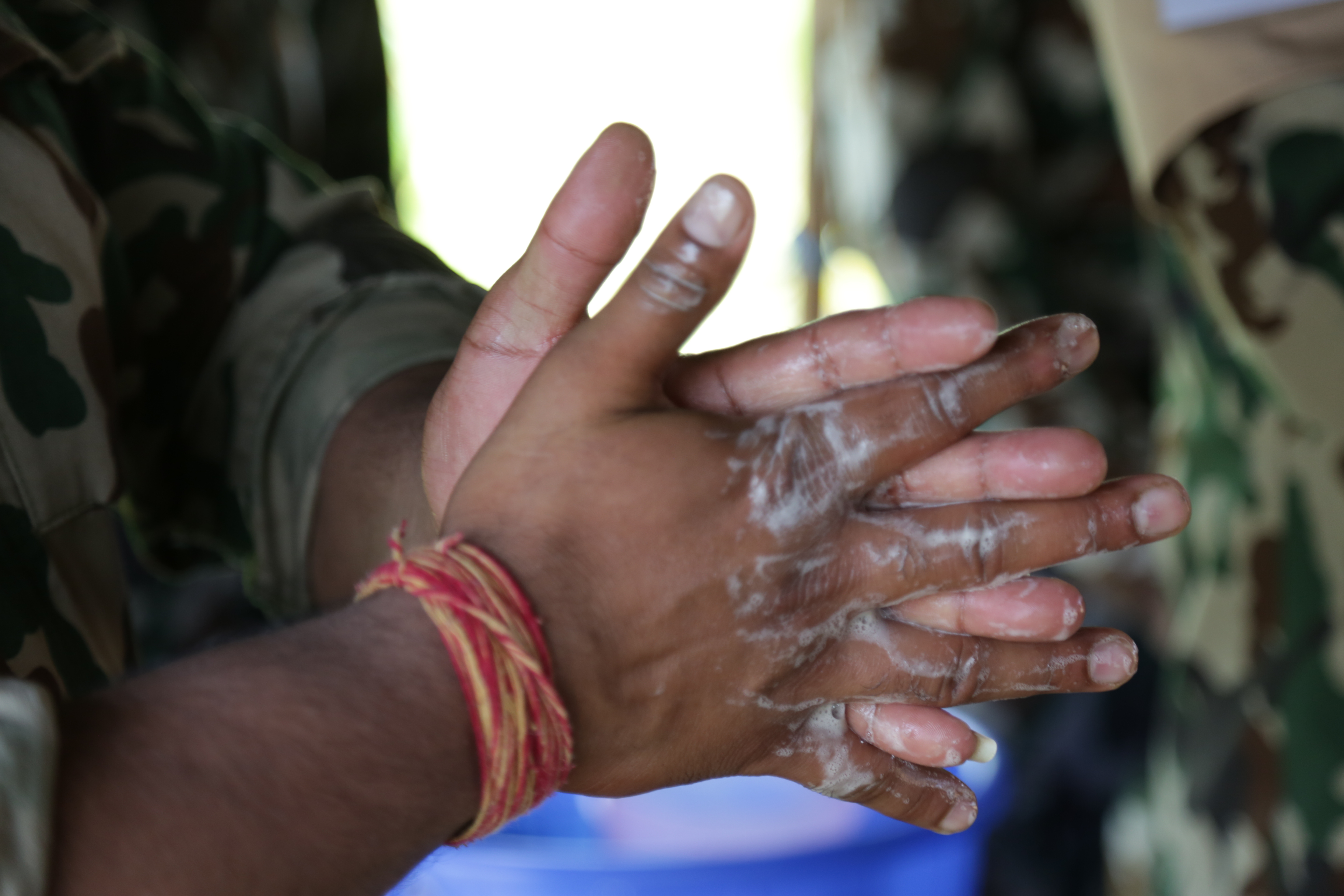 Nepalese peacekeepers serving with United Nations Mission in South Sudan conduct a handwashing activity for local students. UN Photo/Nektarios Markogiannis